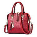BOLSO DE PIEL DE MUJER CON DISEÑO DE COCODRILO